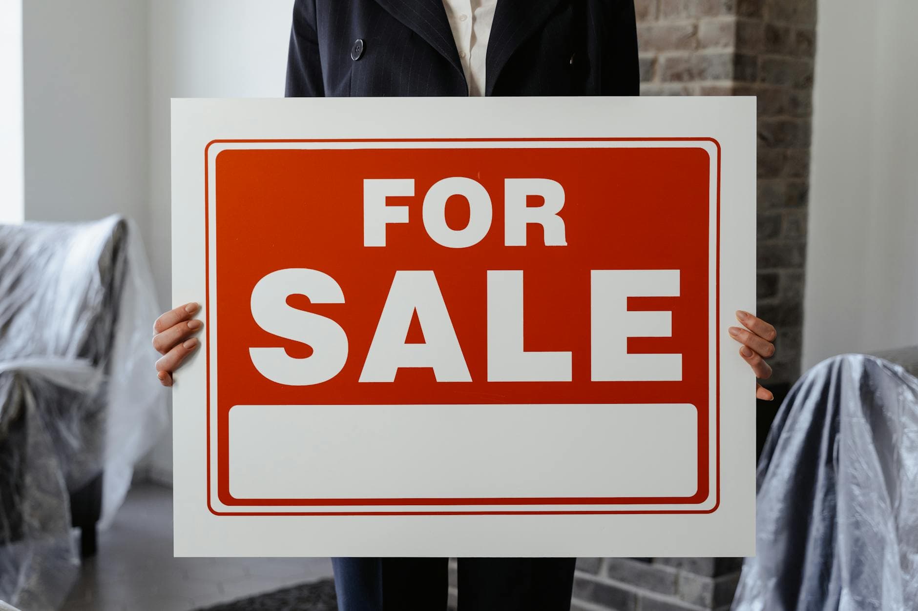 Real estate agent reviewing PPC campaign analytics on computer screen