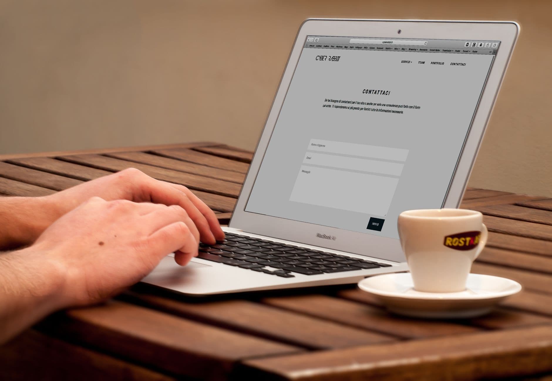 Michigan small business owner reviewing website pricing options on a laptop at a desk