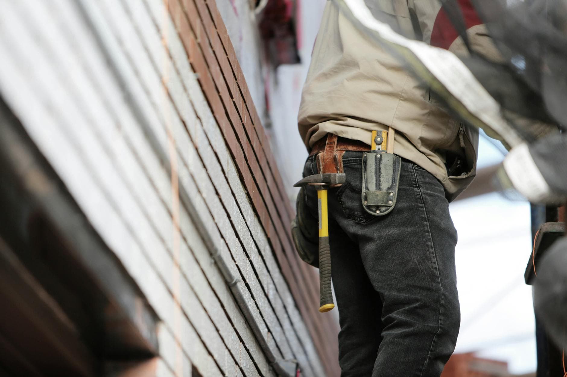 Professional handyman website displayed on laptop and mobile devices