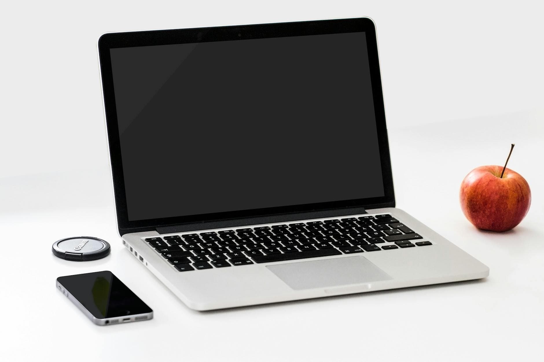 Modern sleek website homepage displayed on desktop and mobile devices